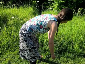 Bending down at the hips, but with some back curvature